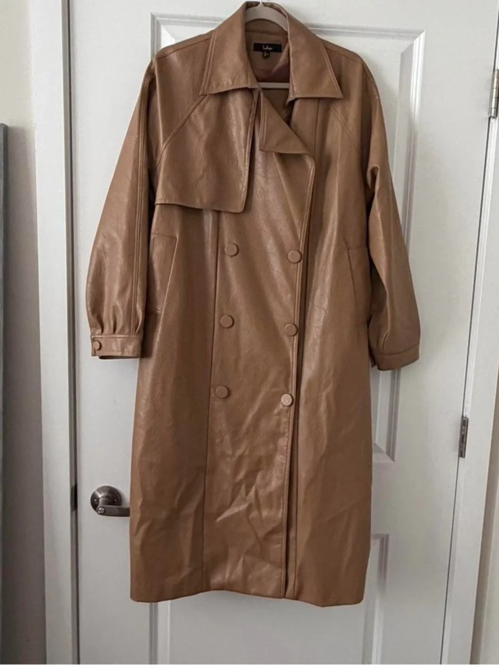 Tan vegan leather trench coat with belt